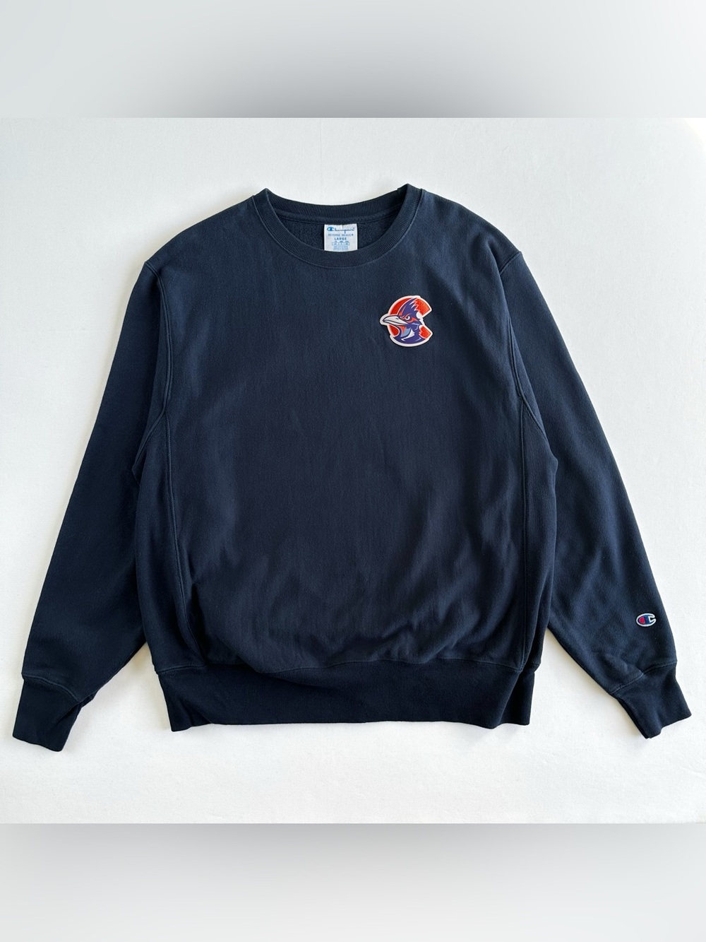 Champion Reverse Weave Navy Crewneck Sweatshirt with Red & White Bird Patch